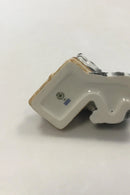 Royal Copenhagen Figurine of raccoon with food basket No 055