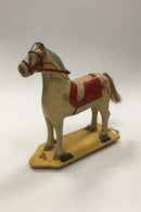 Old toy horse on wheels toy