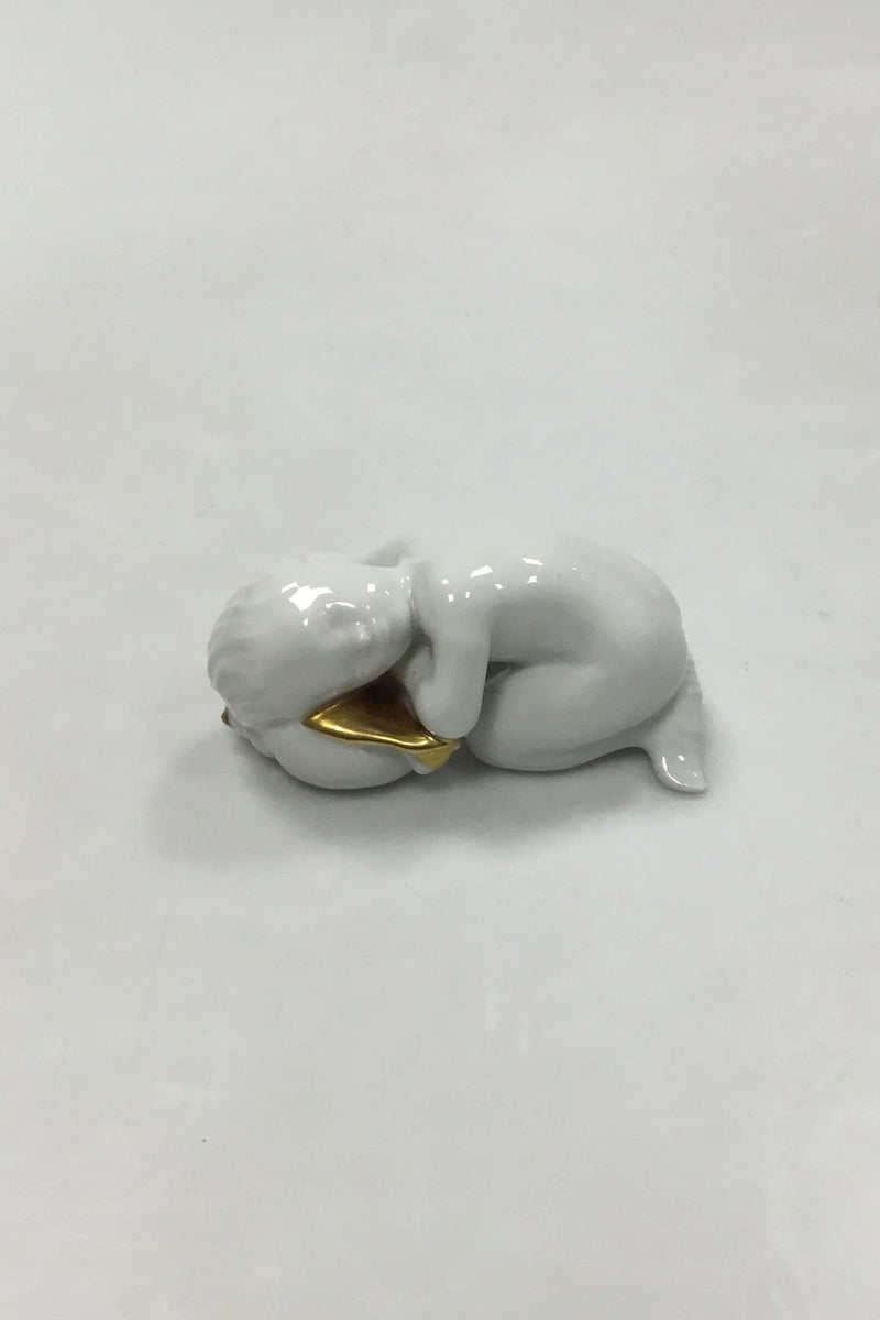 Bing og Grøndahl Blanc de Chine Figur med guld af Havbarn med Konkylie No. 2315