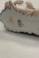 Royal Copenhagen Figur af siddende Dreng og Pige No 4670