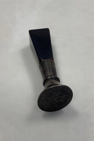 Signet aus Holz und Messing