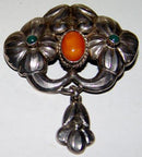 Danish Art Nouveau Brooch with Ambor and Green Stones