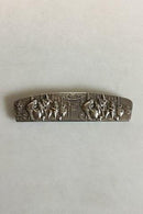 Håndkam med sølv holder med motif i relief