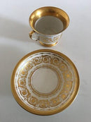 Royal Copenhagen Antike Morgentasse und Untertasse mit handgemaltem Motiv der Börse und der Holmenskirche von 1820-1850.