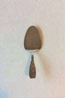 Stjerne, Jens Harald Quistgaard sølvplet Kagespade