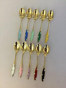 Ein Satz von 10 Kaffeelöffeln aus Silber und Emaille von Frigast