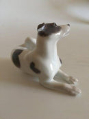 Royal Copenhagen Figur eines liegenden Hundes Nr. 1452/2855
