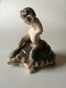 Royal Copenhage Faun/pan på skildpadde No 1880