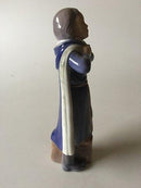 Royal Copenhagen Figurine af Skoledreng med Kappe og Taske No 4503