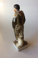 Royal Copenhagen Overglaze figurine of Greenland man No 12225