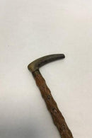 Antique Irish walking stick w.  head of carved antlers horn and shaft of black thorn. Collar of white metal, No ferule.