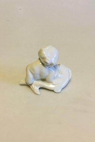 Bing & Grøndahl Blanc de Chine Figur af Havbarn der læner sig op ad fisk No 4037