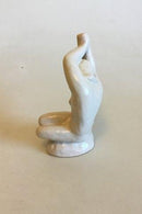 L. Hjorth White glazed ceramic Figurine of sitting woman No 573