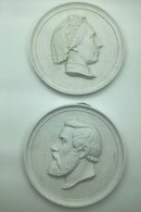 Pair of Royal Copenhagen portrait plates in bisquit by Niels Georg Henriksen 1884