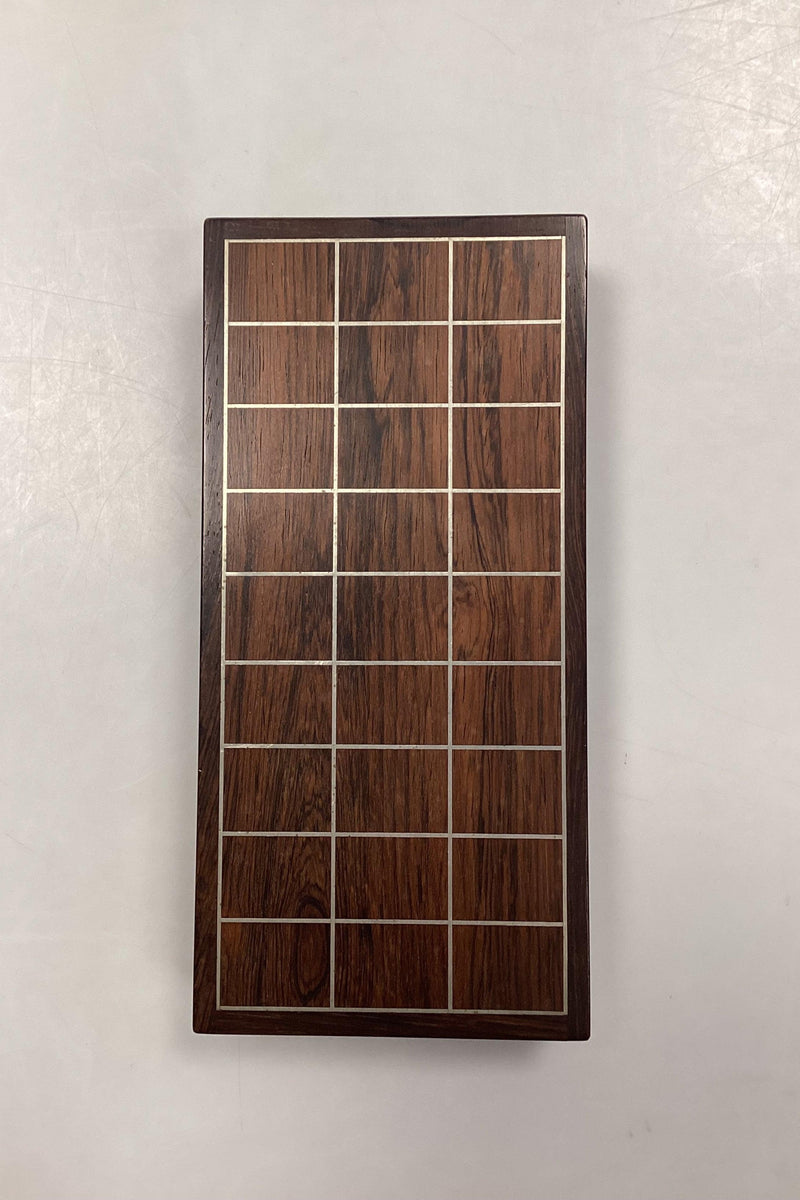 Rosewood box with inlaid metal pattern