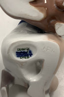 Royal Copenhagen / Bing og Grøndahl 1951 Figur Dreng med gravhund No. 440