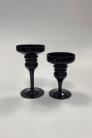 Et par Lysestager i sort glas