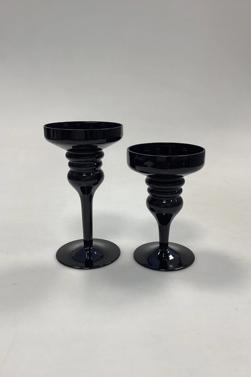 Et par Lysestager i sort glas