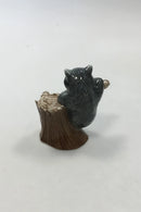 Royal Copenhagen Figurine of Raccoon on tree stump No 054