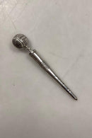 Synål: Sygrej i sølv