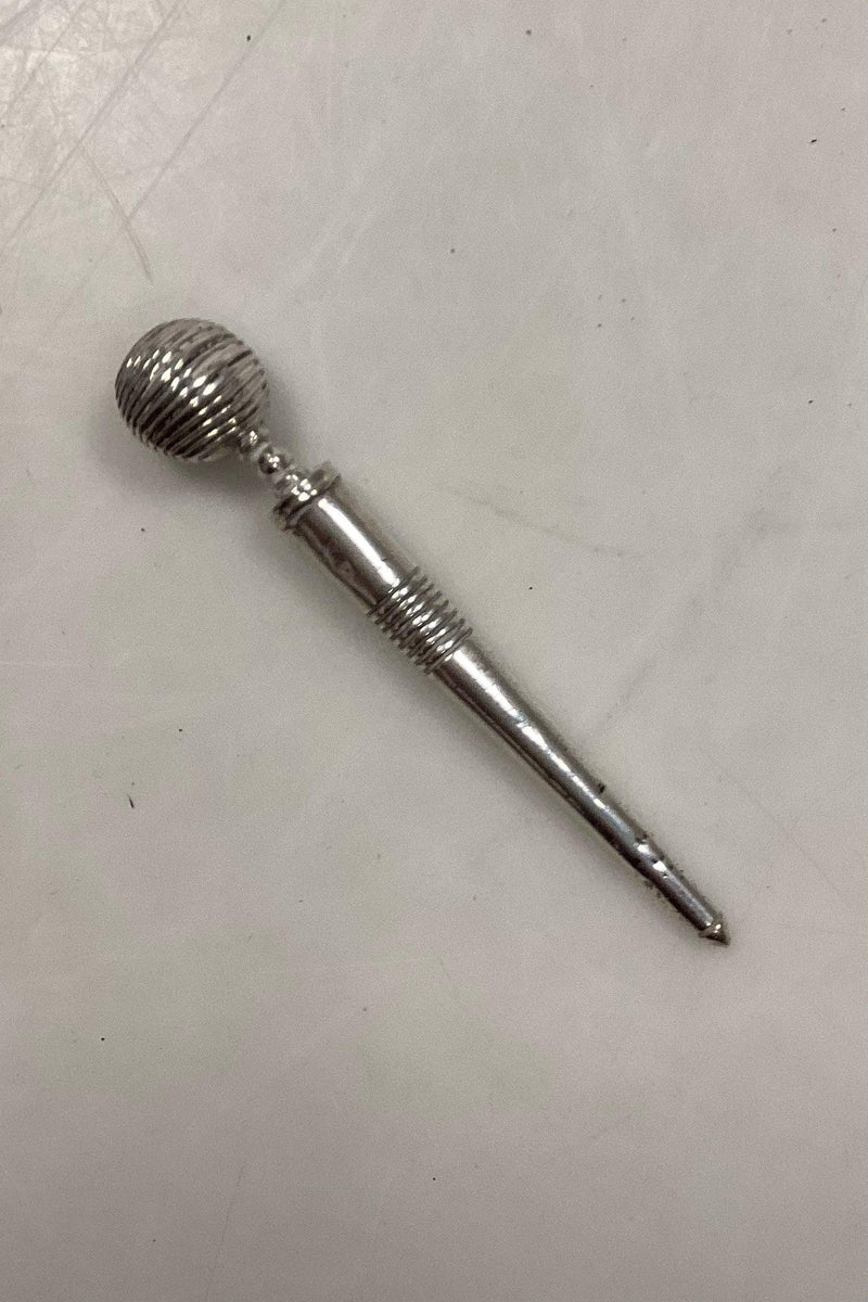 Synål: Sygrej i sølv