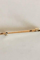 Brooch in 14K. Gold with Brilliant