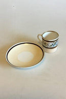 Carl Tielsch / Altwasser Mocca Cup decorated with flower frieze with dragons and gold. From 1875-1909