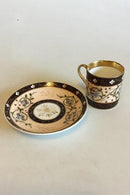 Carl Tielsch / Altwasser Dark brown Mocca cup decorated with flower frieze and gold. From 1875-1909