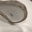 Royal Copenhagen figur af påfugl på kugle. Designet af Arnold Krog.