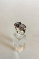 Gold ring with two Amethysts. 14 K