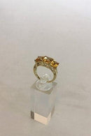 Gold Ring with three yellow stones. 14 K