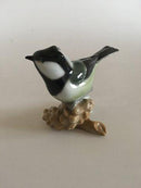 Heubach Figurine af Grøn Spurvefugl på Kogle