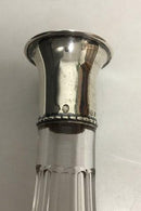 Karaffel i facetslebet krystal glas med sølv krave.