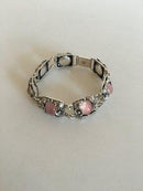 N.E. From スターリングシルバーにピンククォーツをあしらったブレスレット。