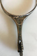 Stirrup with Spur of silver and leather strap.