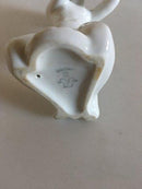 Rørstrand Figurine af Dreng med Konkylie