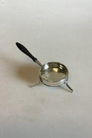 Tidlig Thesi med fødder i Sølv og træ