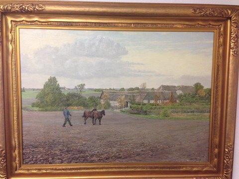 Large and nice Oil painting by Ole Ring with motif of landscape, farm house and man with horse