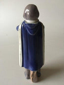 Royal Copenhagen Figurine af Skoledreng med Kappe og Taske No 4503