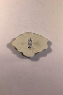 Royal Copenhagen Porcelæns smykke af Arje Griegst