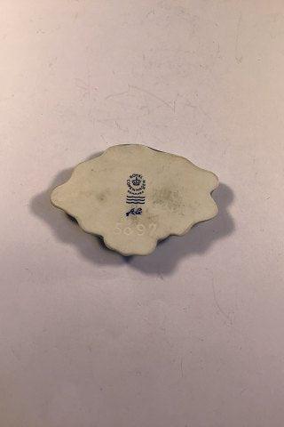 Royal Copenhagen Porcelæns smykke af Arje Griegst