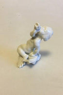 Bing & Grondahl Blanc de Chine Figurine of Boy with Seashell No 4036