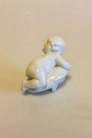 Bing & Grøndahl Blanc de Chine Figur af barn der kigger ned på fisk No 4034