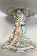 Royal Copenhagen Flora Danica Opsats blomsterdekoration og Putti med due