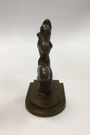 Tinos Bronzefigur/Bogstøtte af knælende kvinde