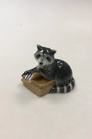 Royal Copenhagen Figurine of raccoon with food basket No 055