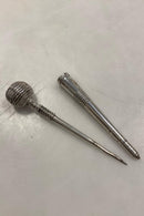 Synål: Sygrej i sølv