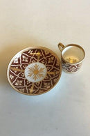 Carl Tielsch / Altwasser Mocca Cup decorated with flower friezes in red and gold. From 1875-1909