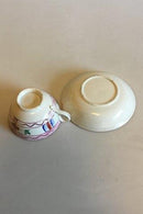 Gammel Thekop med rød dekoration