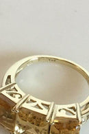 Gold Ring with three yellow stones. 14 K